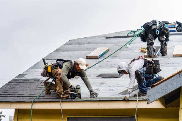 Professional Gutter Installation technician working in Warren, OH